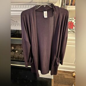 Women’s purple cardigan.